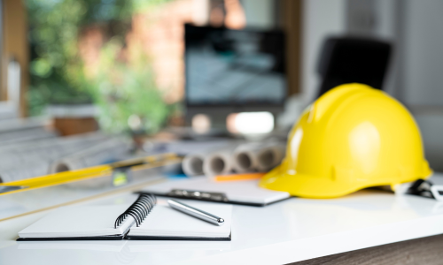 Contractor supplies spread across a table.
